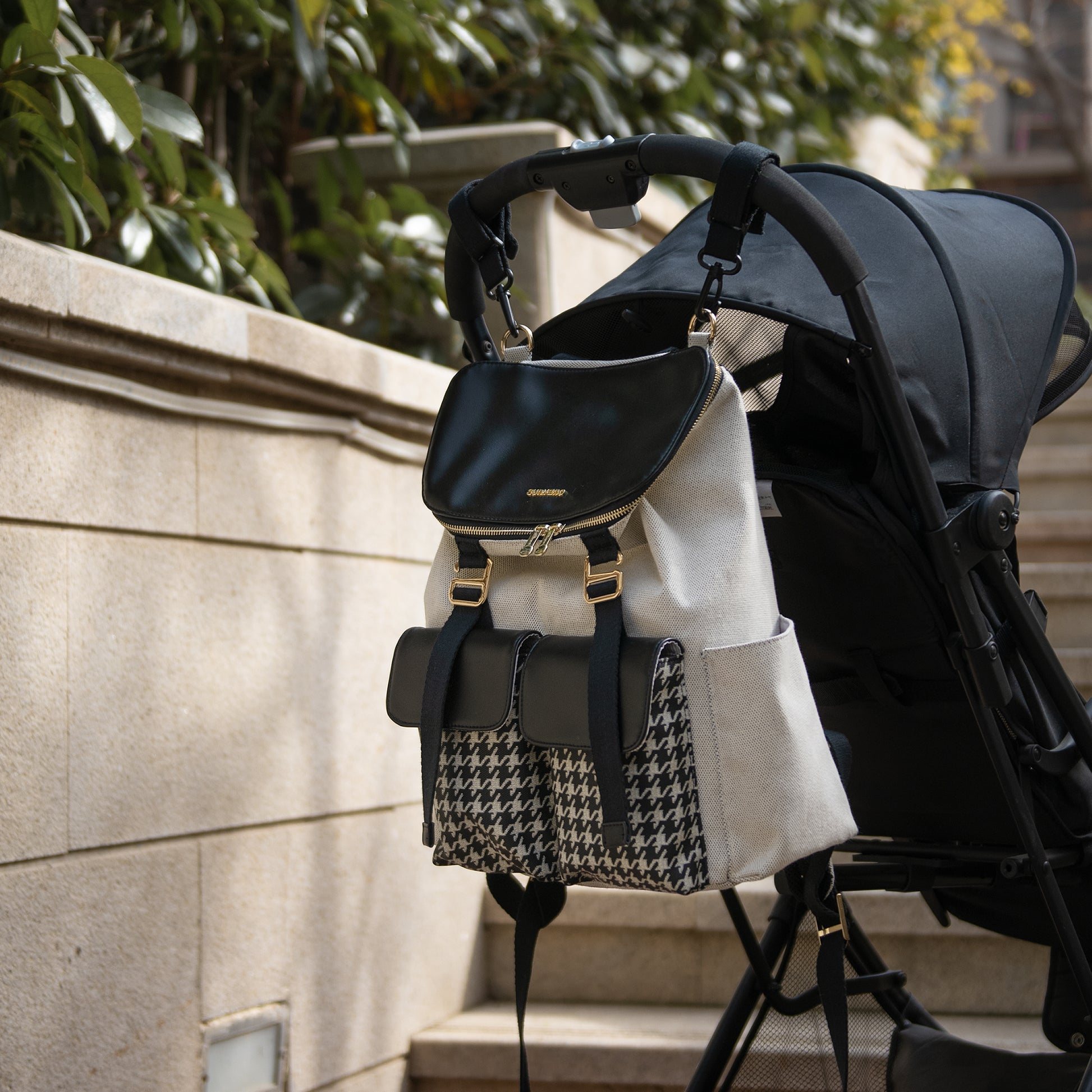 Image of Houndstooth Diaper Backpack 511124299 from Edmene LLC